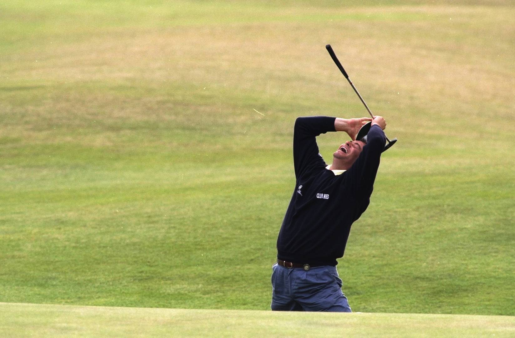 An ecstatic Costantino Rocca after holing from the valley of sin, 1995